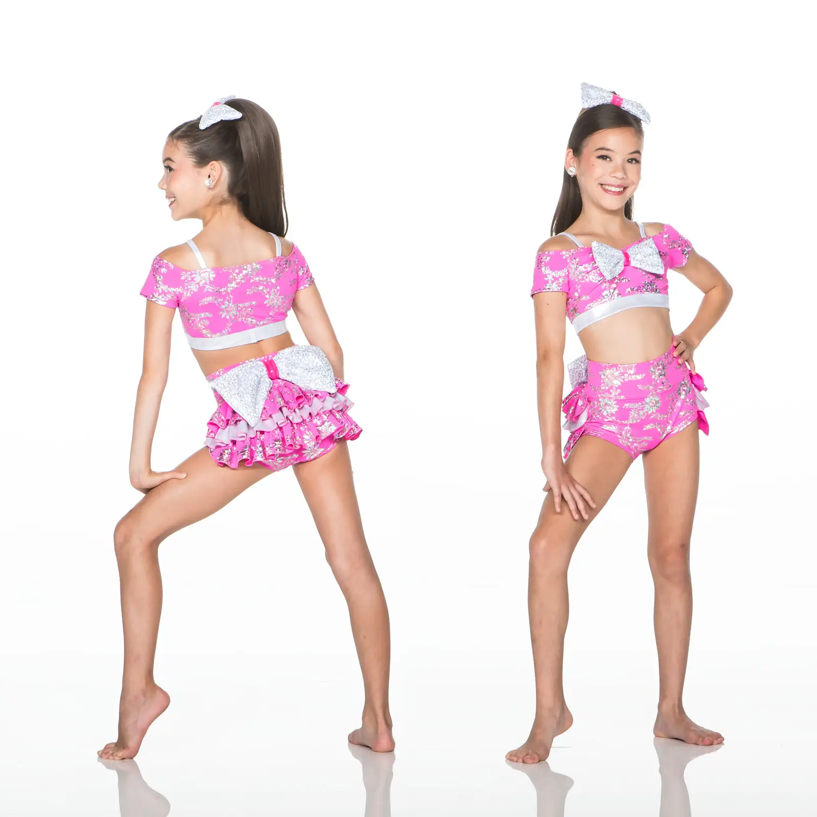 Girl modeling pink floral dance costume, front and back views.