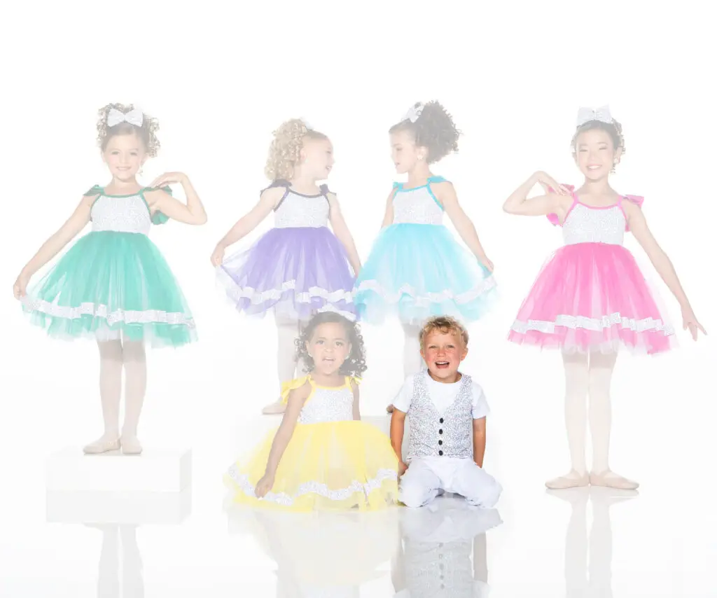 Children modeling colorful tutu dresses and a patterned vest