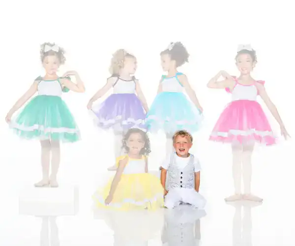 Children modeling colorful tutu dresses and a patterned vest
