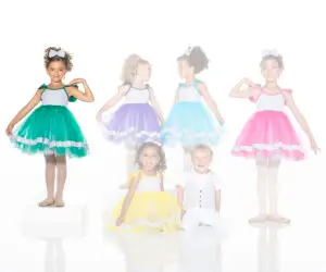 Children modeling colorful formal dresses and a white vest