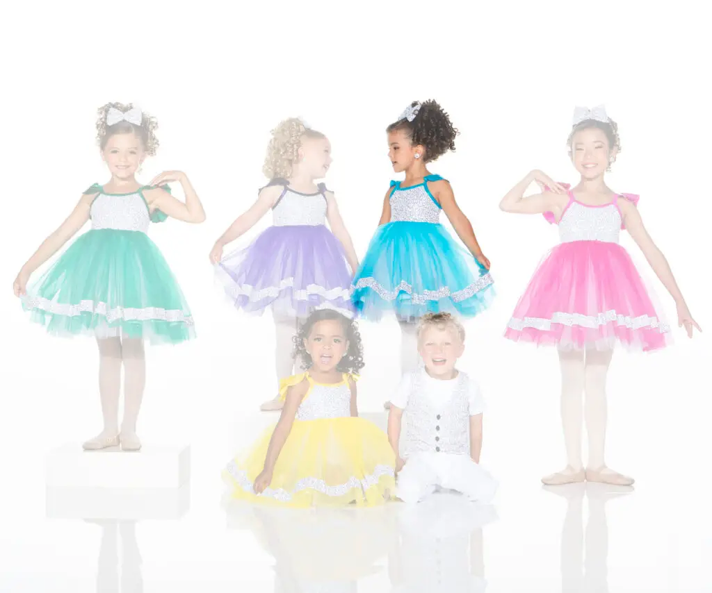 Children modeling colorful tulle dresses and formal vest outfit