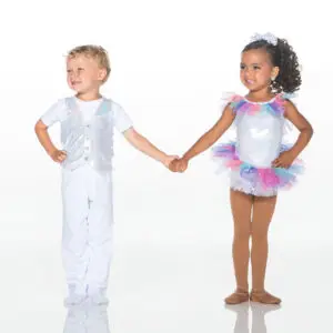 Two children holding hands in colorful dance costumes