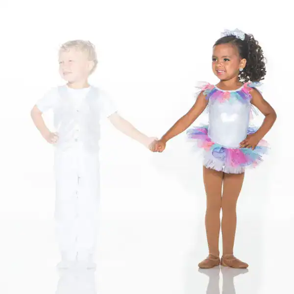 Children holding hands in glittery dance costumes