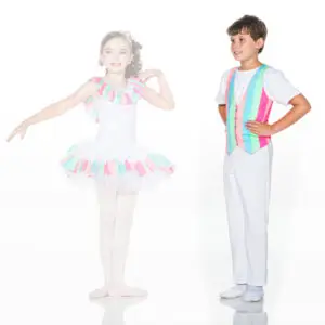 Two children in colorful dance costumes posing together