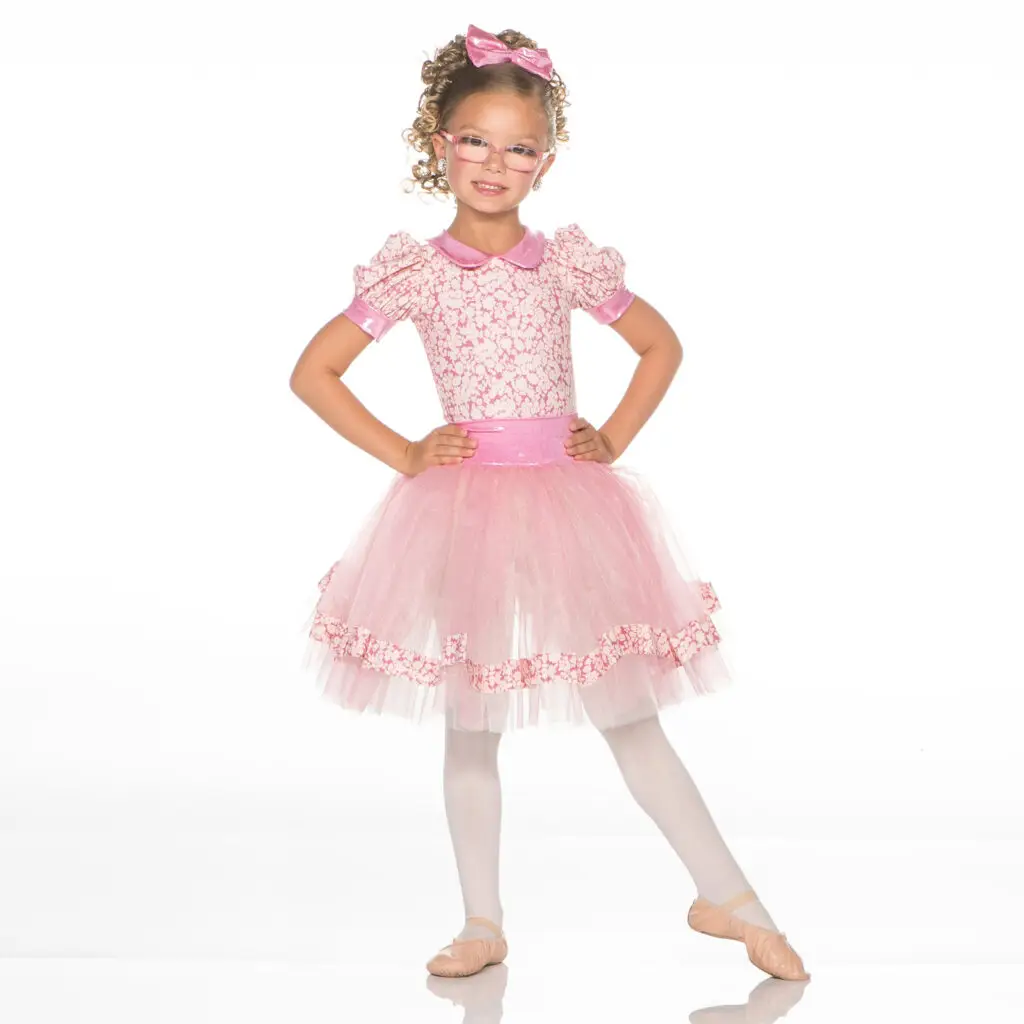 Girl wearing pink floral ballet costume and glasses
