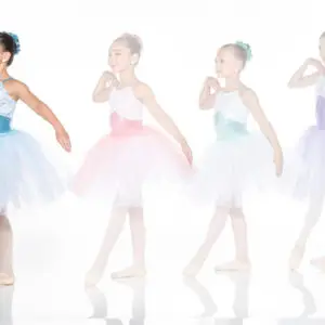 Four young ballerinas modeling pastel tutu dresses
