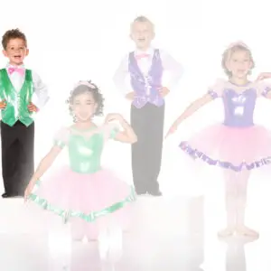 Four children in colorful dance costumes posing in studio