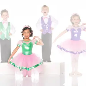Four children posing in colorful dance costumes