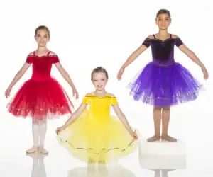 Young boy and girl wearing dance recital costumes