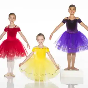 Young boy and girl wearing dance recital costumes