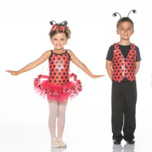 Two children wearing red-and-black ladybug costumes with antennae.