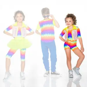 Three children modeling colorful rainbow outfits against white background
