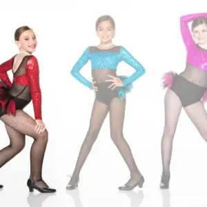 Three young dancers wearing colorful costumes and fishnet tights