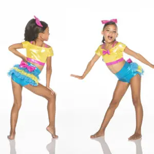Young dancer modeling colorful yellow and blue dance costume