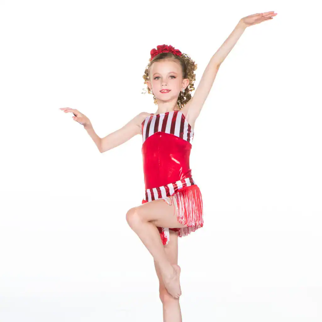 Young dancer poses in red striped costume