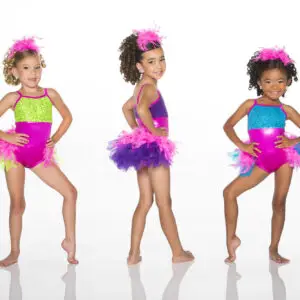 Three young dancers in colorful sequined costumes and feathered skirts