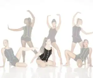Six dancers in black leotards pose against white background.