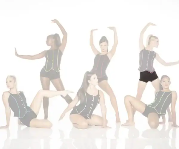 Five dancers pose in black costumes with colorful trim.