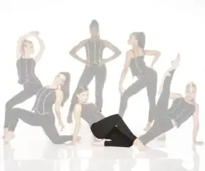 Six women modeling black outfits with colorful piping