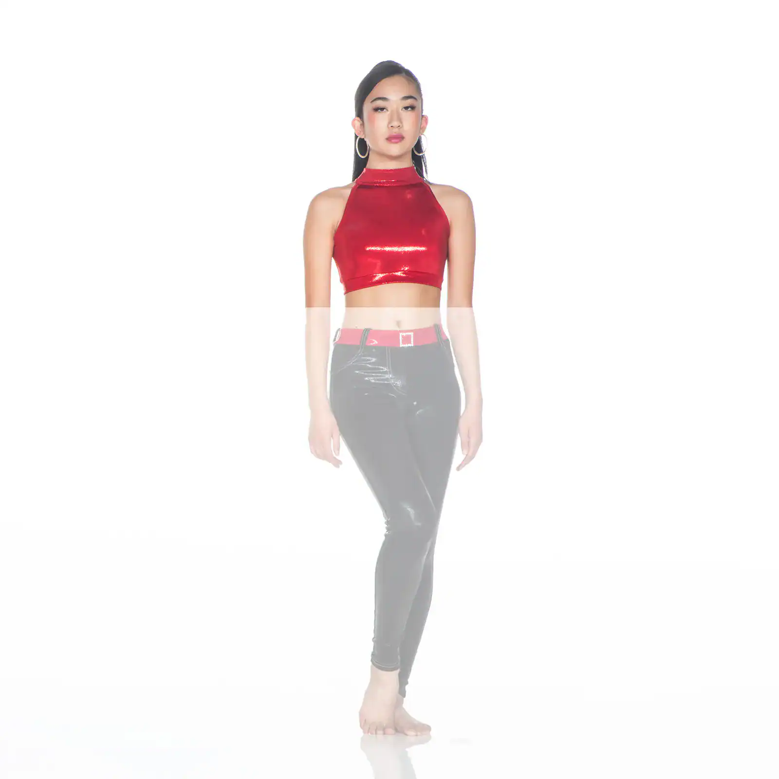Model wearing red halter crop top and black pants
