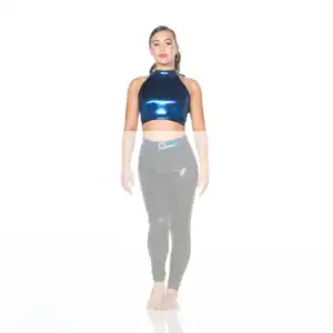 Woman modeling metallic blue halter crop top and black pants