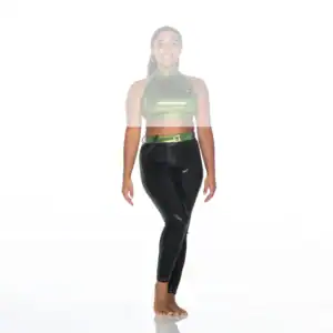 Woman wearing green crop top and black leggings