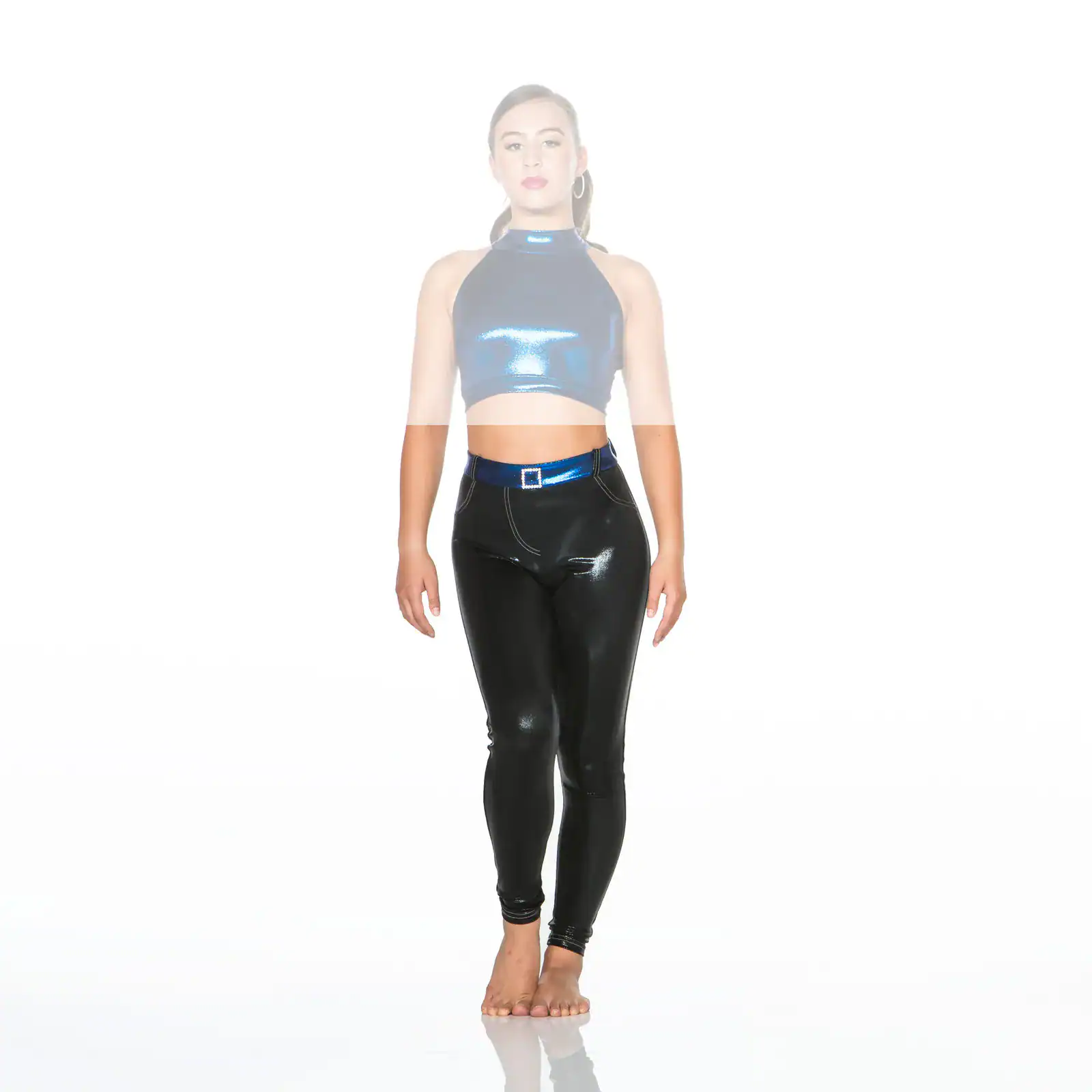 Woman wearing metallic blue crop top and black leggings