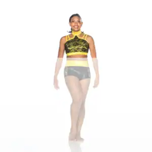 Smiling dancer in black and yellow performance outfit