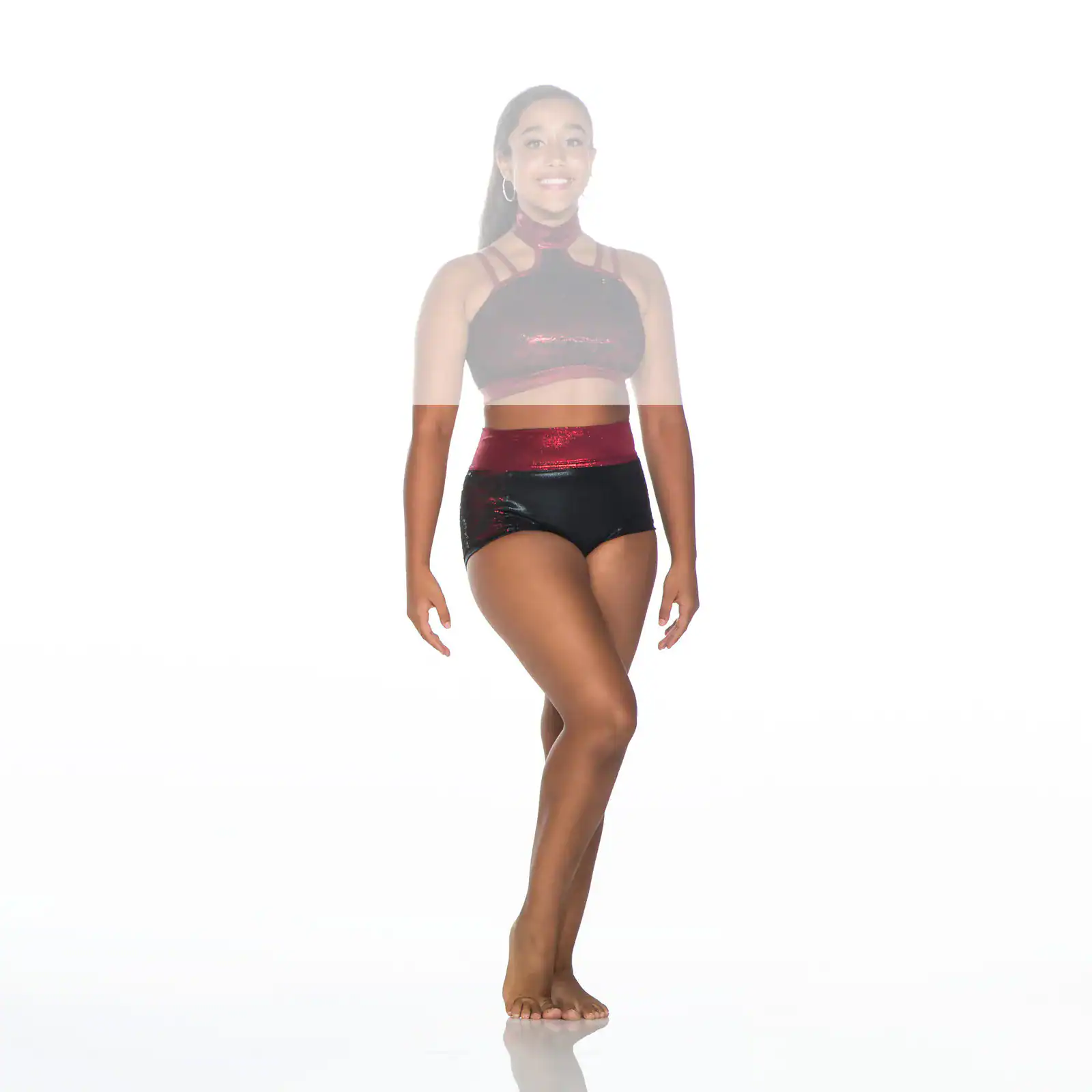 Smiling dancer in black and burgundy two-piece costume