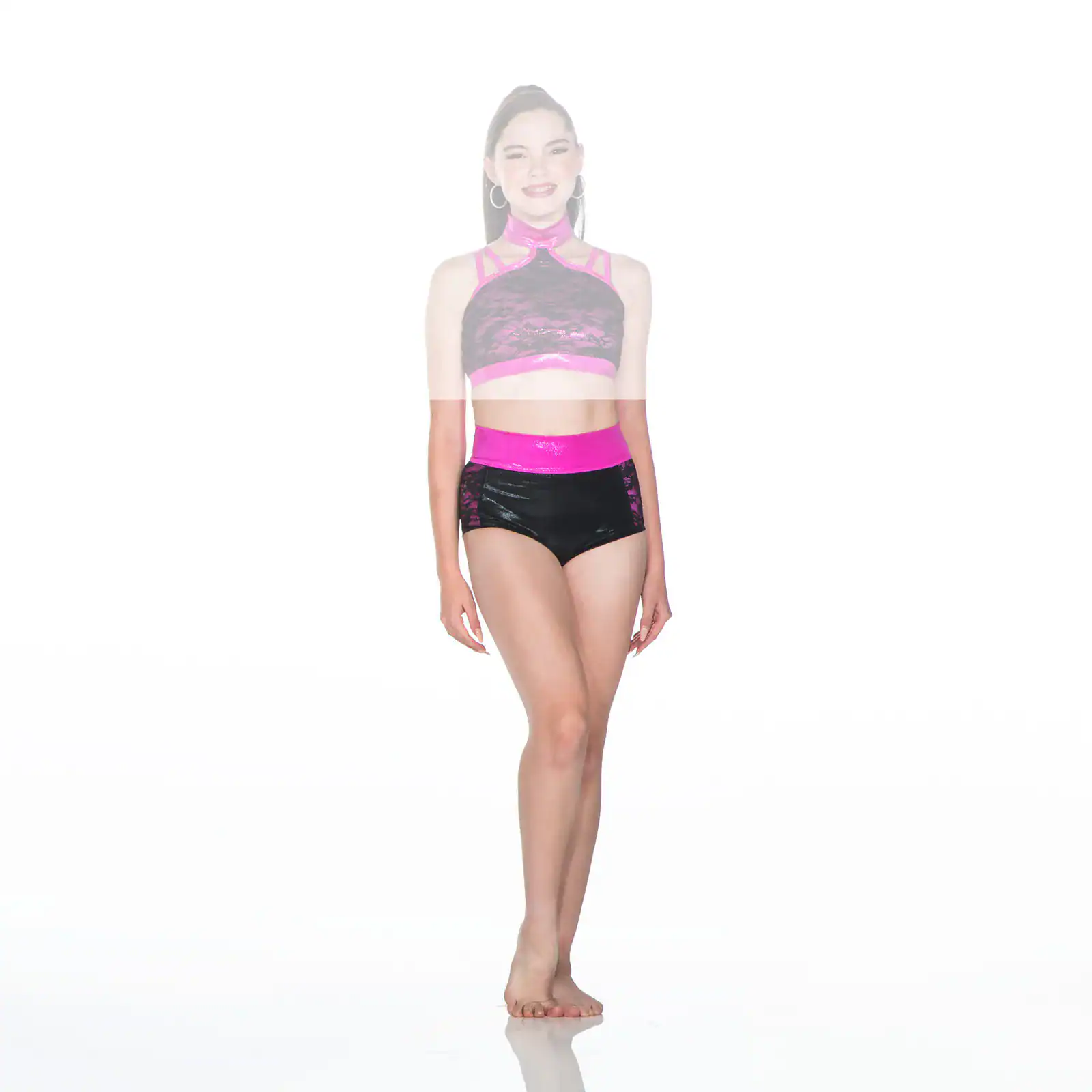 Smiling woman wearing black and pink dancewear