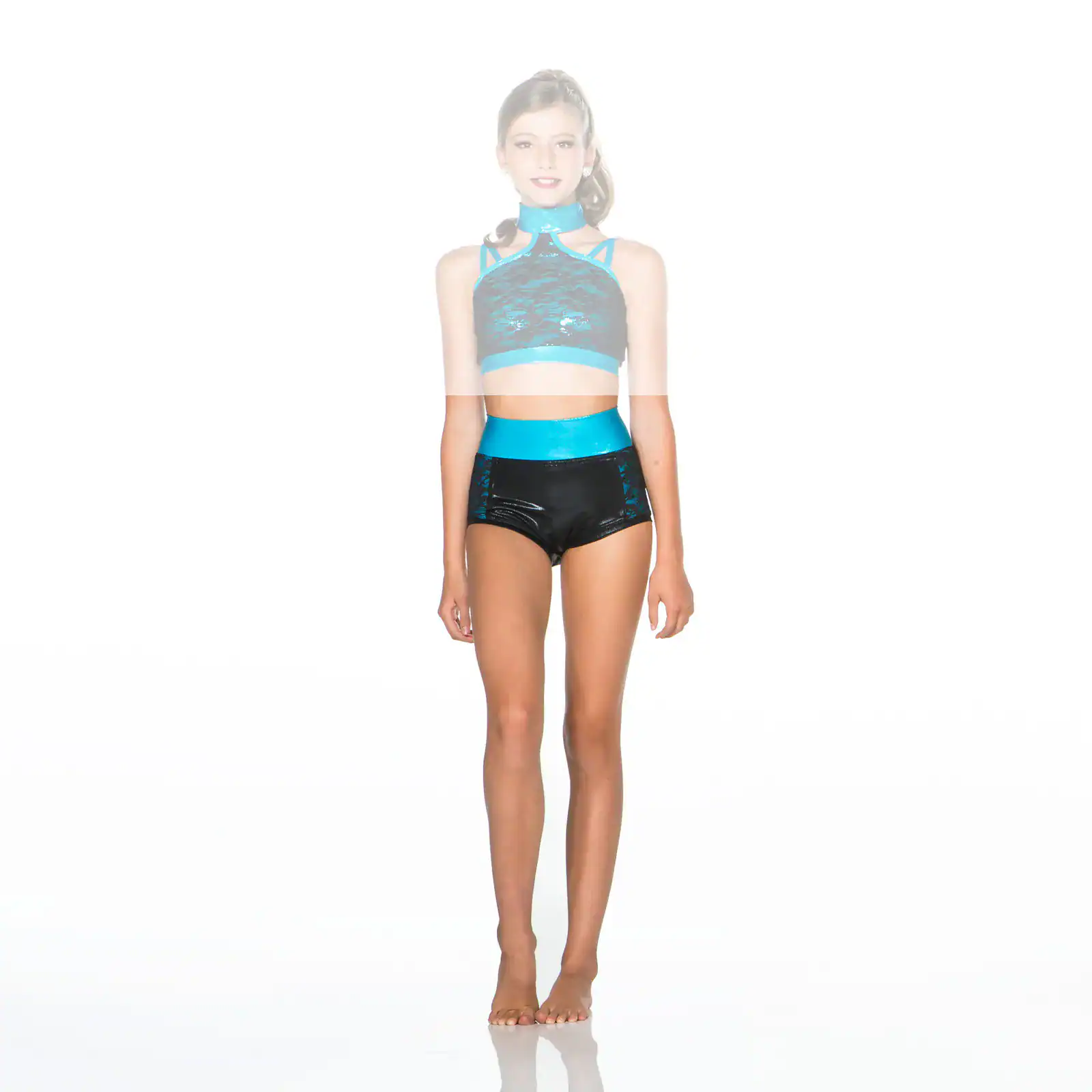 Young dancer wearing a turquoise and black performance outfit