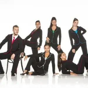 Six models in black suits with colorful piping pose