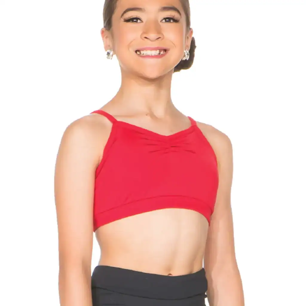Smiling dancer wearing red crop top and black pants