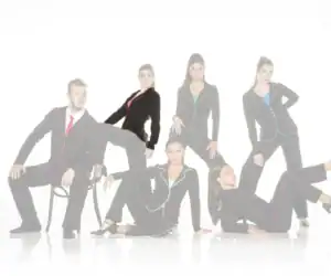 Six models wearing black suits with colorful piping