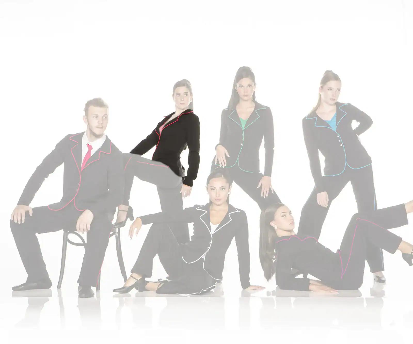 Six models wearing black suits with colorful piping