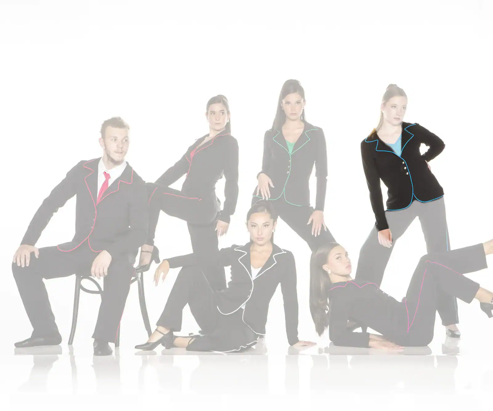 Six models pose in black suits with colorful piping.