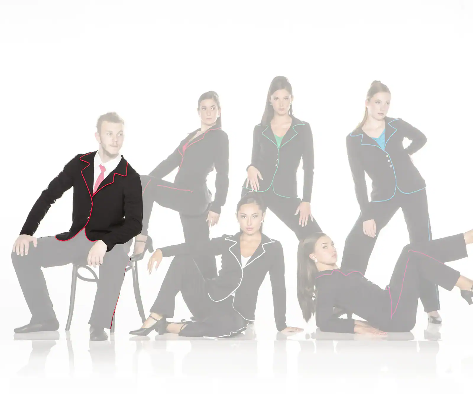 Six models wear black suits with colorful piping.