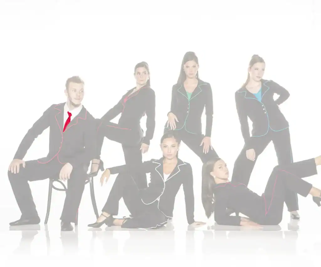Six models in black suits with colorful piping pose together.