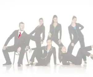 Six models in black suits with colorful piping pose.