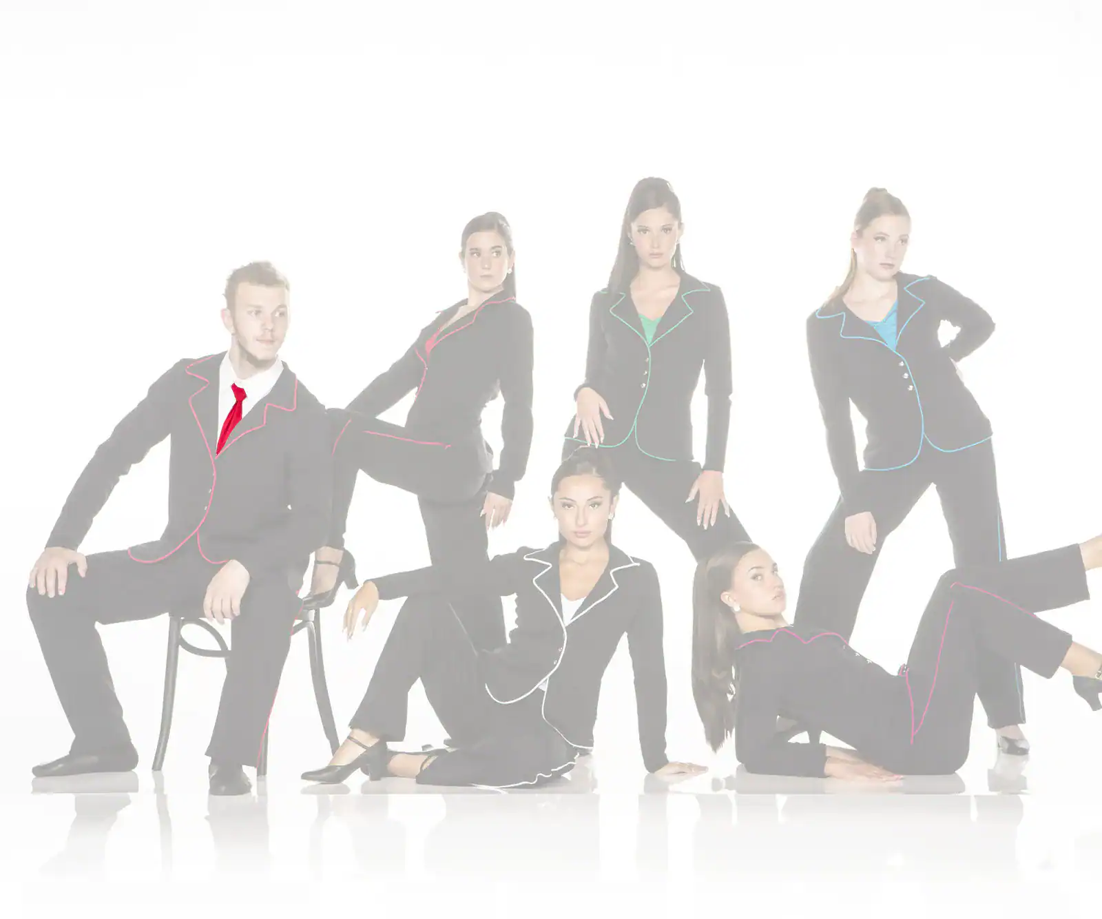 Seven models in black suits with colorful piping