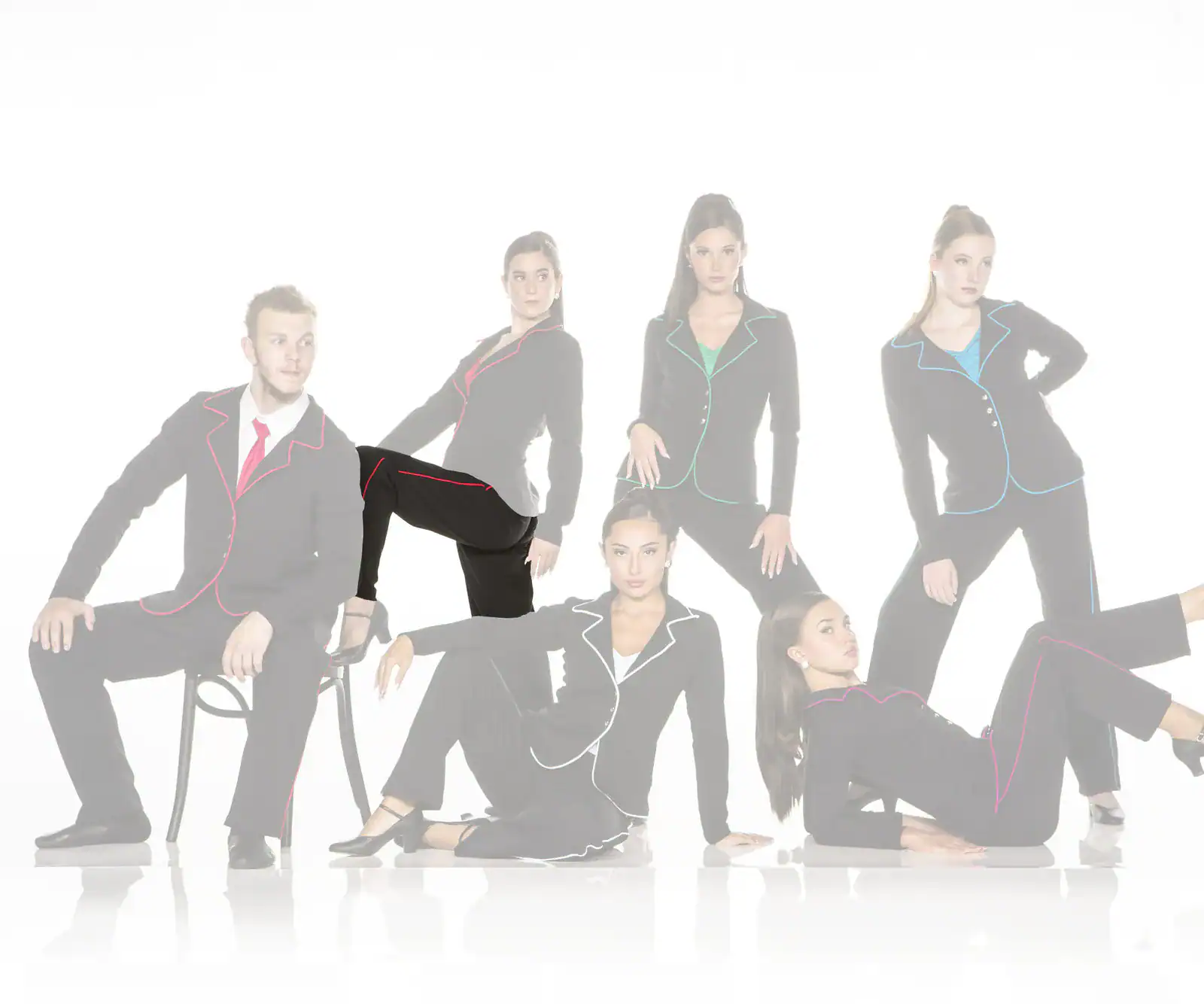 Six models pose in black suits with colorful piping.