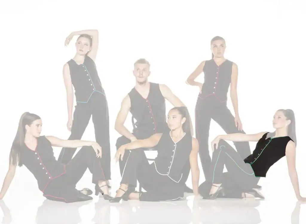 Six dancers pose in black outfits with colorful trim