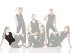 Five models wearing black outfits with colorful trim
