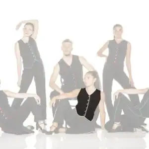 Five models pose in black outfits with colorful trim.