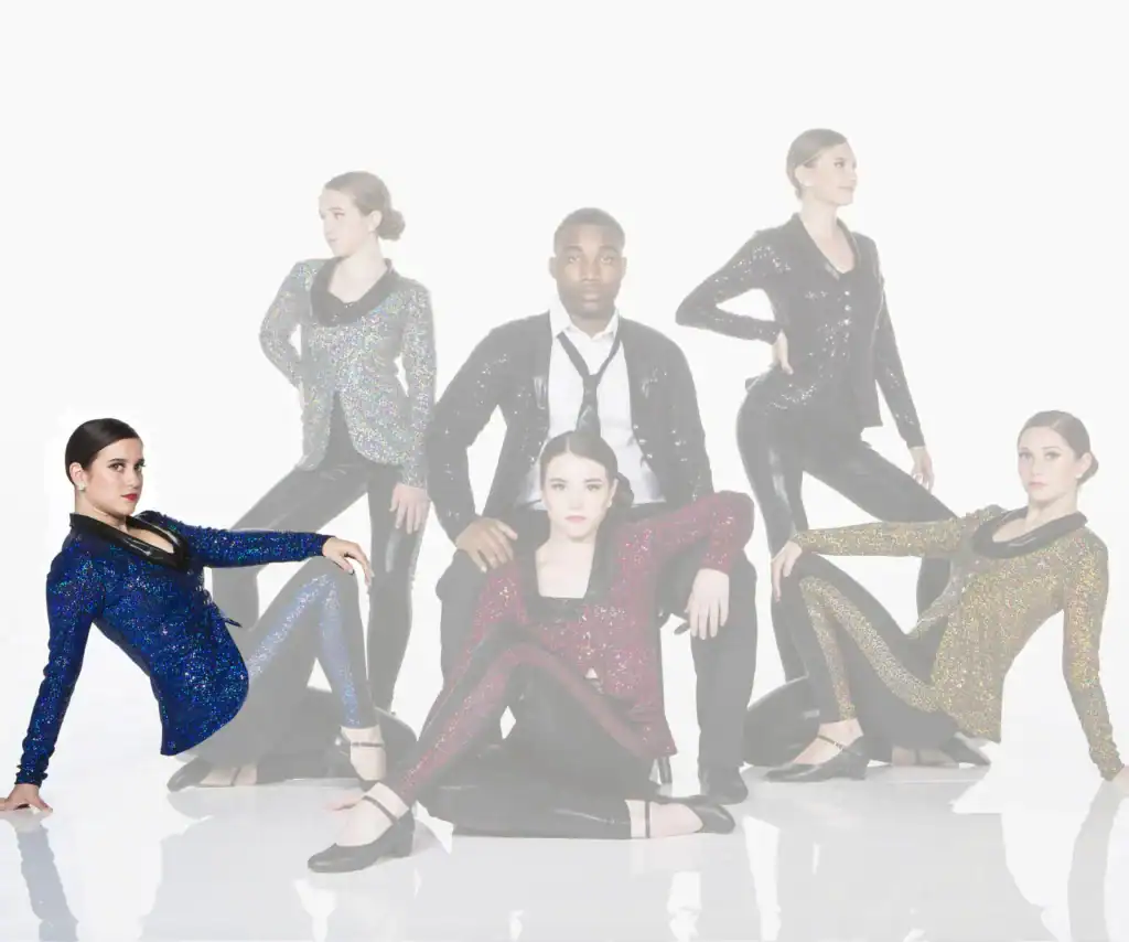 Five performers pose in sparkling jackets against white background.