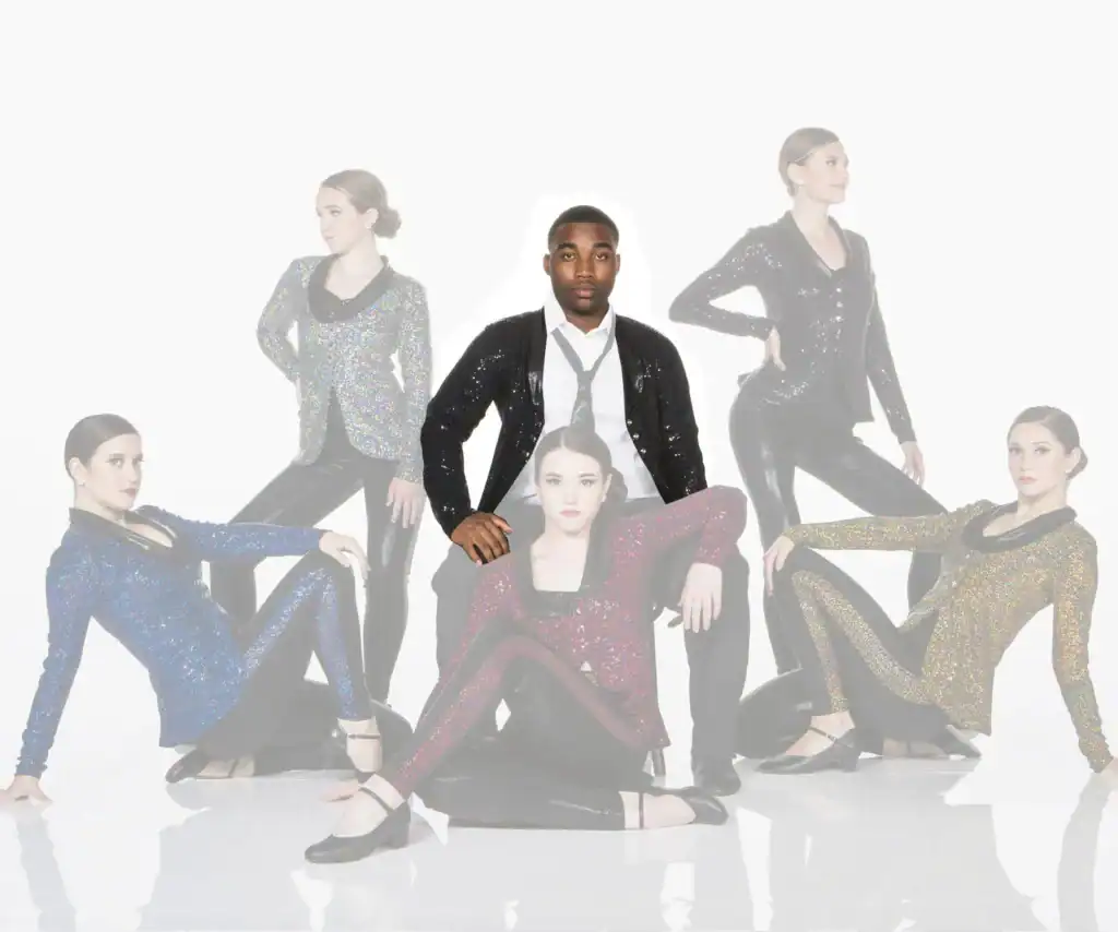 Five dancers pose in sparkling jackets against a white background.