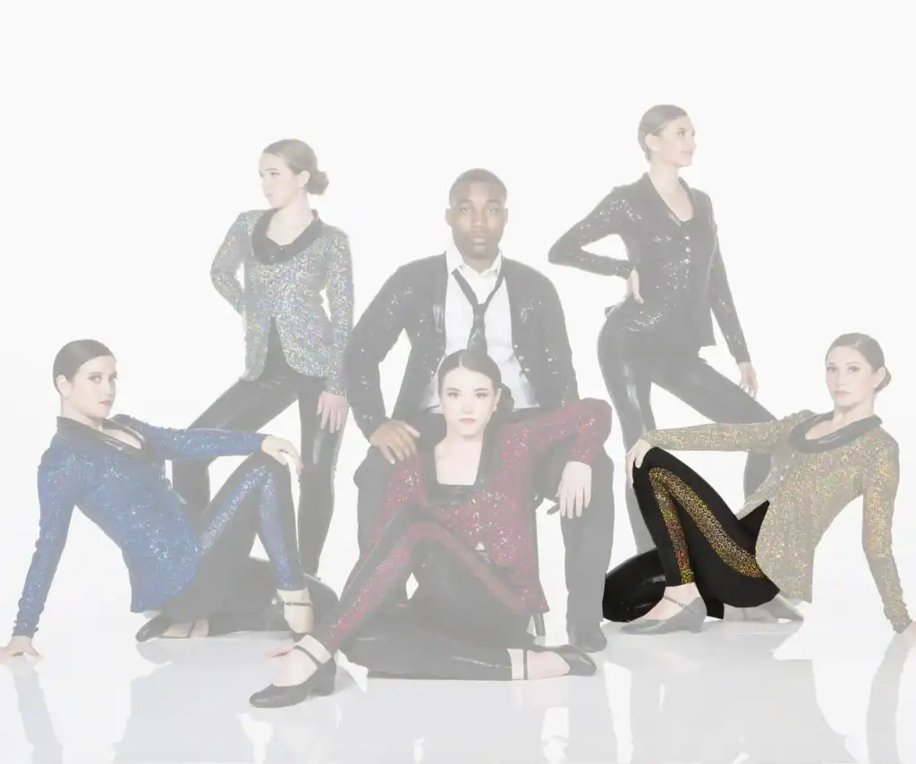 Five dancers pose in sparkling costumes against white background.