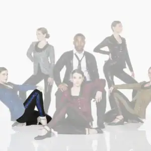 Five dancers pose in glittery jackets against white background.
