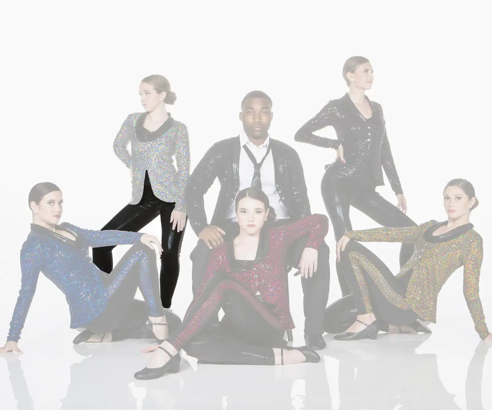 Five performers in sparkling jackets pose against white background.