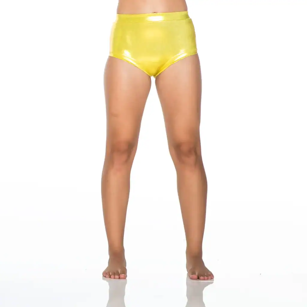 Model wearing shiny yellow high-waisted shorts